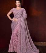 Pink embroidered net saree with blouse