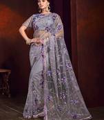 Lilac embroidered net saree with blouse