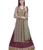 Gold embroidered net kurta with lehenga