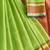 parrot green woven cotton saree with blouse