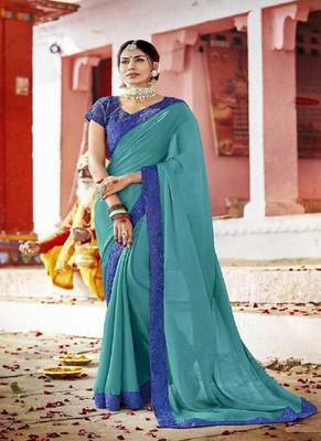 Teal embroidered georgette saree with blouse 1