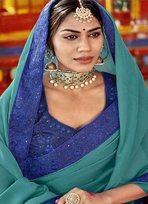 Teal embroidered georgette saree with blouse 2