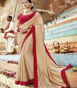 Cream embroidered georgette saree with blouse