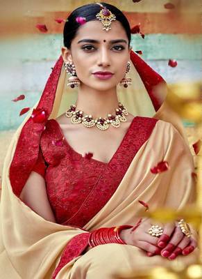 Cream embroidered georgette saree with blouse 2