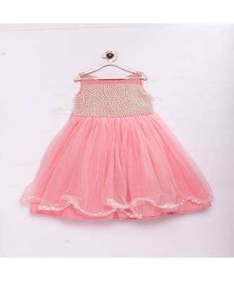Peach fashionable girls net with pearls on front , flared party gown  1