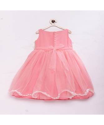 Peach fashionable girls net with pearls on front , flared party gown  3
