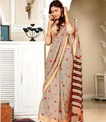 Beige woven jute saree with blouse