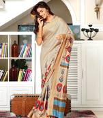 Beige woven jute saree with blouse