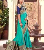   turquoise woven silk blend saree with blouse