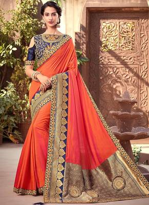 Orange woven silk blend saree with blouse 1