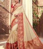 Beige woven silk blend saree with blouse