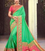   sea green woven silk blend saree with blouse