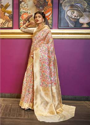 Cream woven silk blend saree with blouse 1