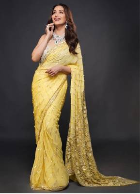 Yellow embroidered georgette saree with blouse 1