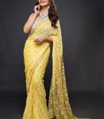 Yellow embroidered georgette saree with blouse
