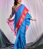 Sky Blue Dupion Silk Saree With Allover Butta And Pink Dual Border & Zari Pallu