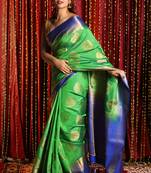 Green Dual Tone Blended Silk With Allover Zari Weaving And Blue Border & Pallu