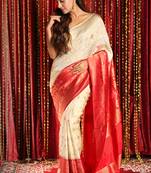 Off White Floral Zari Weaved Semi Banarasi Saree With Red Boreder And Pallu