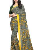 Yellow plain georgette saree with blouse