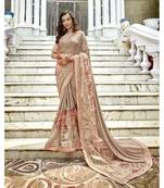 Beige embroidered lycra saree with blouse
