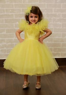 Yellow plain net kids-frocks 1