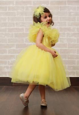Yellow plain net kids-frocks 2