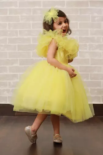 Yellow plain net kids-frocks