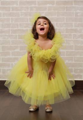Yellow plain net kids-frocks 3