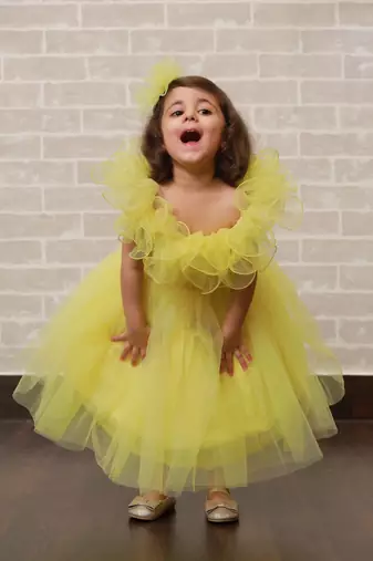 Yellow plain net kids-frocks