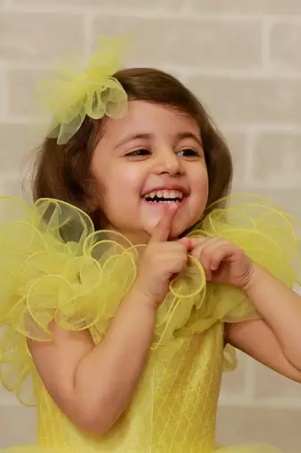 Yellow plain net kids-frocks