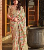 Cream woven banarasi silk saree with blouse