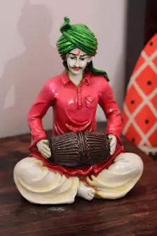 Polyresin Rajasthani Lady Playing Dholak Showpiece