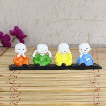 Set of 4 Multi color Monks Polyresin Tealight Holder 1