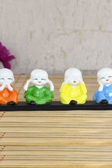 Set of 4 Multi color Monks Polyresin Tealight Holder