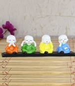 Set of 4 Multi color Monks Polyresin Tealight Holder