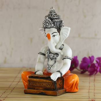 Lord Ganesha playing Harmonium Decorative Showpiece 1