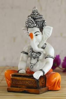 Lord Ganesha playing Harmonium Decorative Showpiece