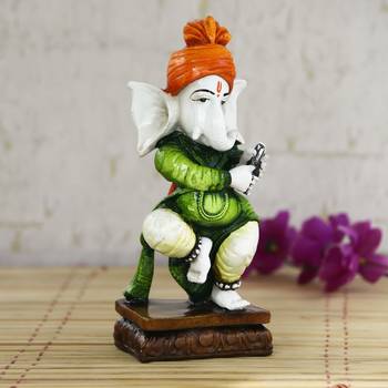 Lord Ganesha playing instrument Decorative Showpiece 1