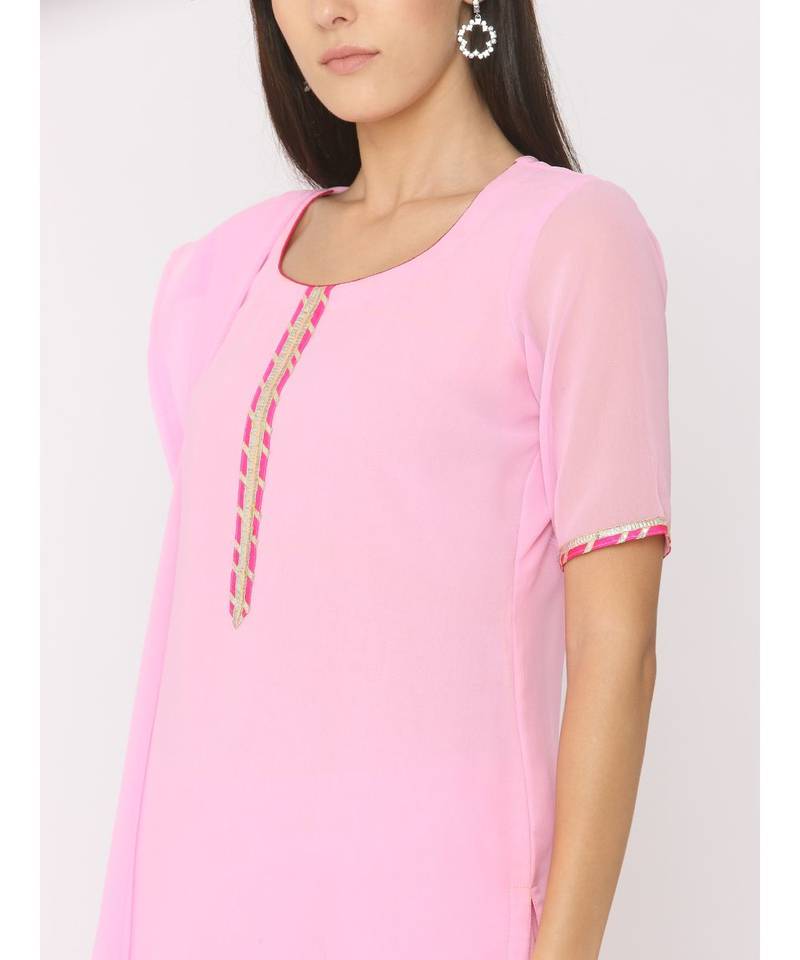 Short Pink Kurti paired with Pink Sharara and Pink Duppatta