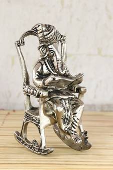 Lord Ganesha on Rocking Chair Antique Showpiece
