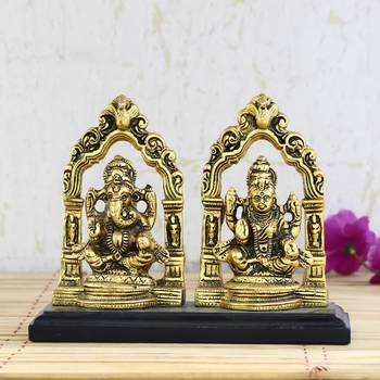 Golden Metal Statue of Goddess Laxmi and Lord Ganesha 1