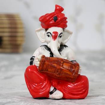 Lord Ganesha playing Dholak 1