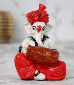 Lord Ganesha playing Dholak
