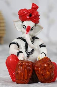 Lord Ganesha playing Tabla