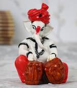 Lord Ganesha playing Tabla
