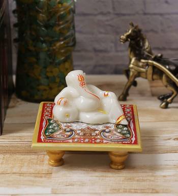 Lord Ganesha resting on Marble Chowki 1