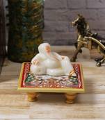 Lord Ganesha resting on Marble Chowki