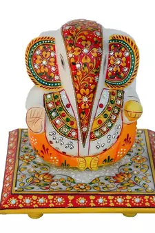 Lord Ganesha on Floral Designed Marble Chowki