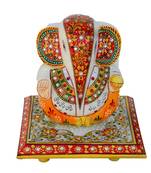 Lord Ganesha on Floral Designed Marble Chowki