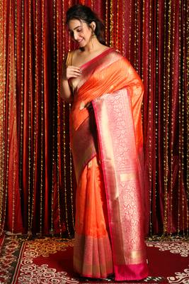 Orange woven tussar silk saree with blouse 1
